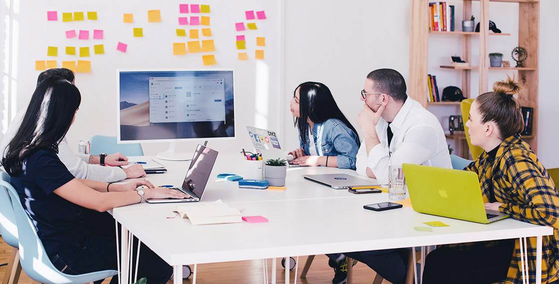 Team working together around a table in the office